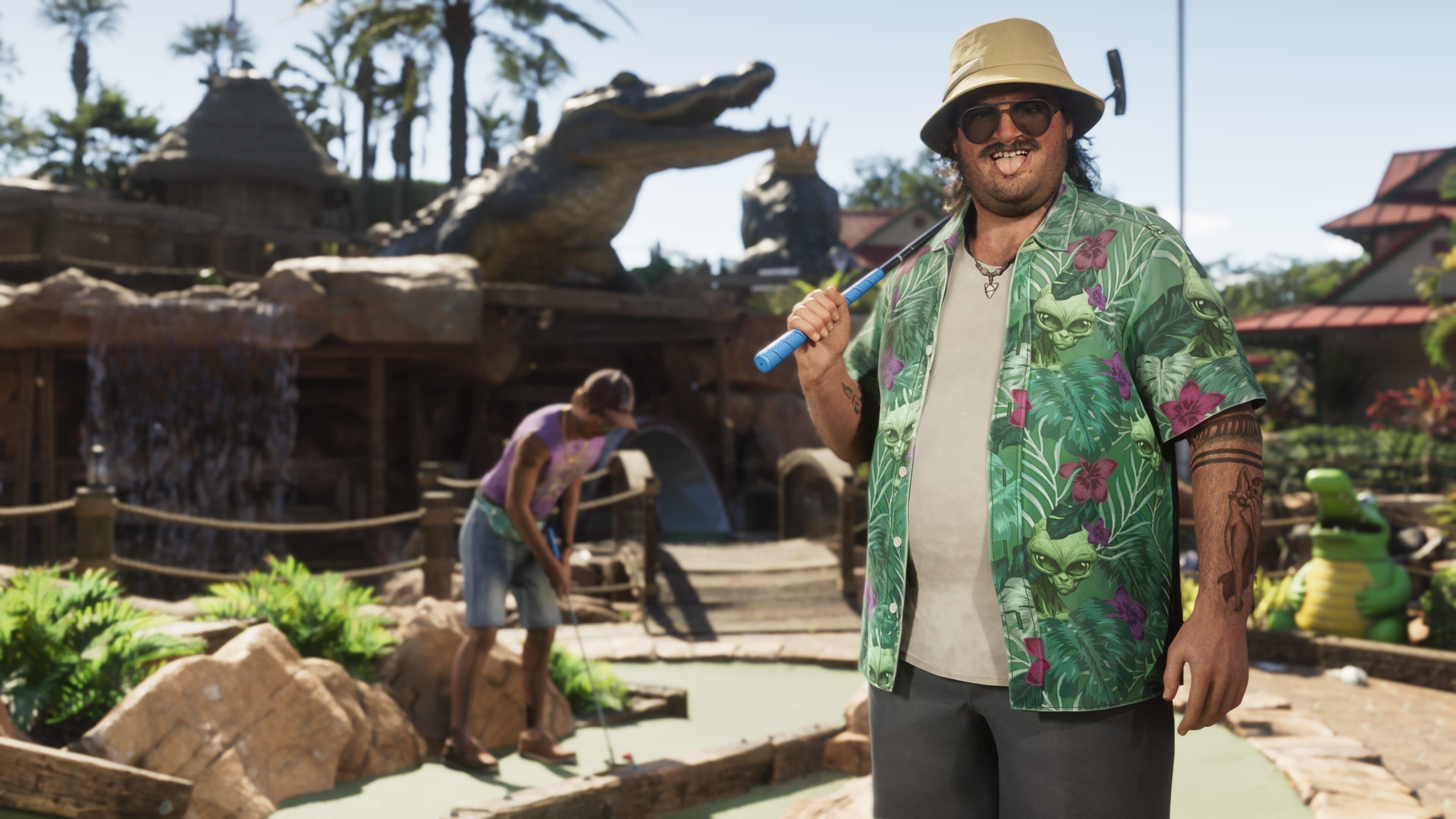 Cal Hampton con un palo de golf